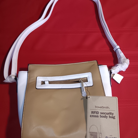 TravelSmith Handbags - TravelSmith Beige and White Crossbody Bag